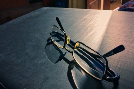 glasses on a dark background, shadow of the rim, metallic materialの写真素材