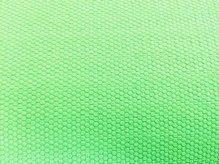 painted rubber as background, rough surface, green backgroundの写真素材