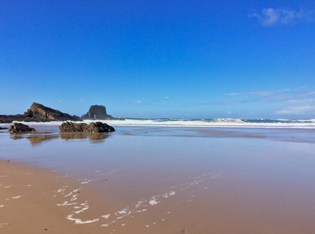 beautiful seascape, rocks near the sea, waves and surfの写真素材