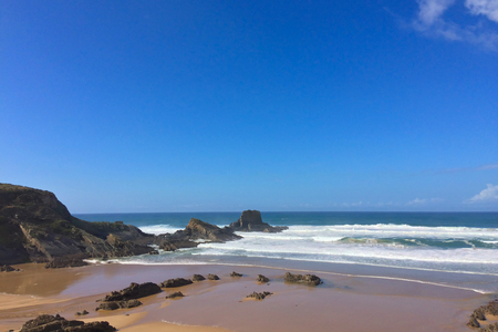 beautiful seascape, rocks near the sea, waves and surfの写真素材