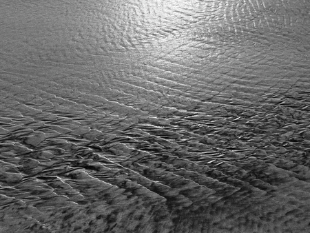 patterns created Ð¾n the sand by waves and wind, sand pattern as backgroundの写真素材