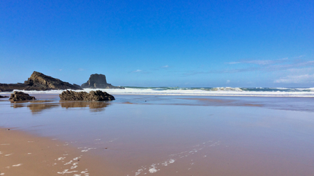 beautiful seascape, rocks near the sea, waves and surfの写真素材