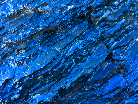 wet rock, stone formations as a backgroundの写真素材