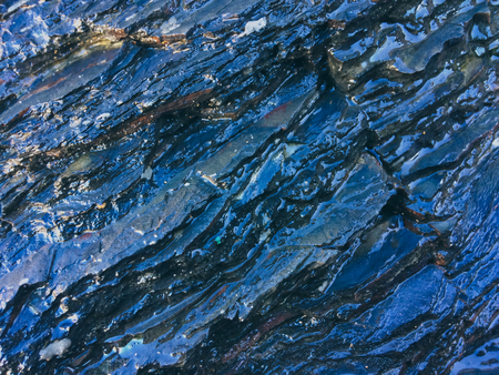 wet rock, stone formations as a backgroundの写真素材