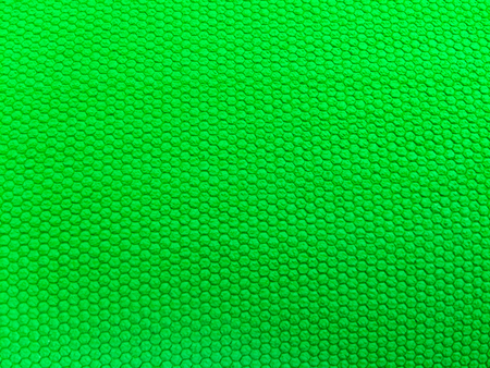 painted rubber as background, rough surface, green backgroundの写真素材