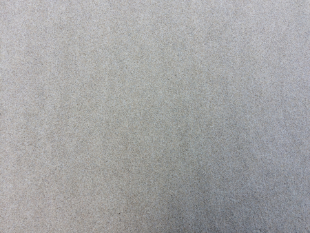 wet sand as a background, sand texture of an unusual colorの写真素材