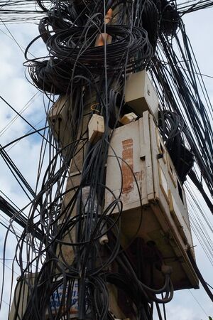 Cambodia, Siem Reap 12/08/2018 chaos in power lines, tangled city communications, problems with...