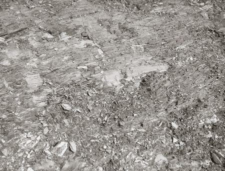 black and white image of stone chips as a background, rocky surfaceの写真素材