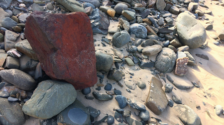 red stone, unusual stone, be bright, stand out from the crowdの写真素材