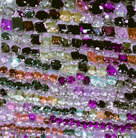 women's rings with precious stones, women's jewelry, a large number of jewelry, background