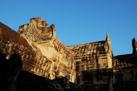 Fragment of an ancient stone temple in Cambodia. The ancient architecture of Southeast Asia. Abandoned temple.の写真素材