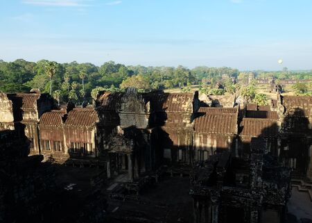 Fragment of an old Hindu temple in the forests of Cambodia. Abandoned building in the forest.の写真素材