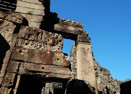 The ruins of medieval Khmer buildings. Fragments of decorative stone carving.の写真素材