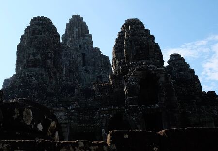 Monumental ancient temple of Bayon in Cambodia. Medieval temple in Indochina. Architectural art of ancient civilizations. Bayon temple in Angkor Thom. Face towers.の写真素材