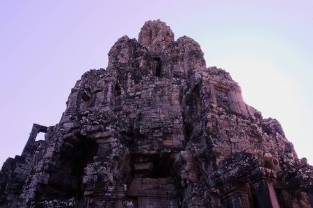 Monumental ancient temple of Bayon in Cambodia. Medieval temple in Indochina. Architectural art of ancient civilizations.の写真素材