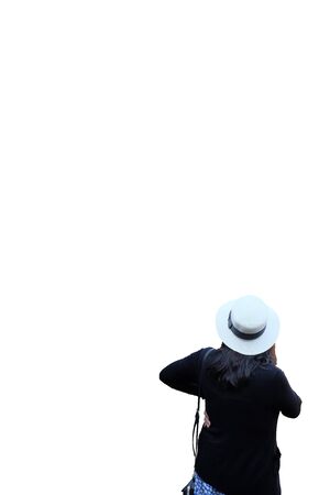 Black-haired woman in a white hat and black sweater. Women's back. Isolated on white background.の写真素材