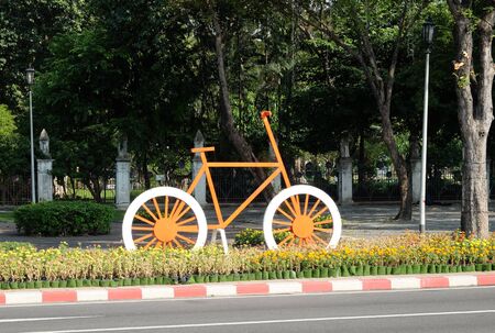 Decorative multi-colored bicycles adorn the street of Bangkok.の写真素材