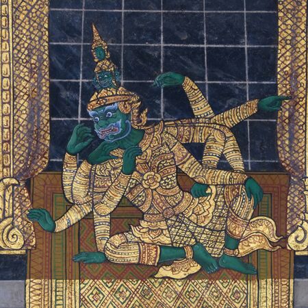 Bangkok, Thailand, December 27, 2018. An ancient wall drawing depicting a mythical ten-armed...