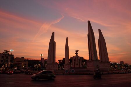 Bangkok, Thailand, December 27, 2018. Democracy Monument on the street of Bangkok at sunset. Pink skies.のeditorial素材