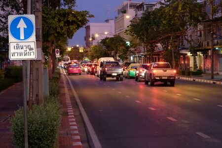 Bangkok, Thailand, December 27, 2018. Cars stand in a traffic jam at night. Evening city traffic.のeditorial素材