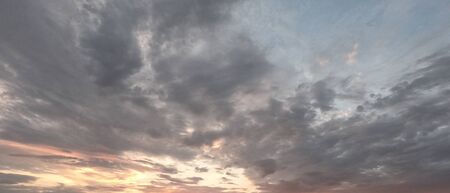 The evening cloudy sky. Dramatic sky. Evening landscape, twilight.