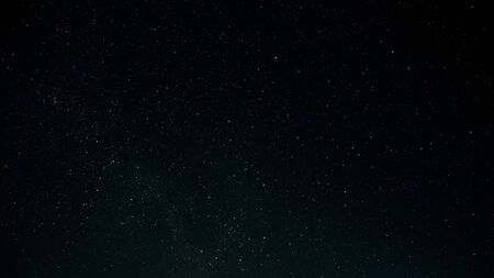 Starry night sky as a background. Dark interstellar space.の写真素材