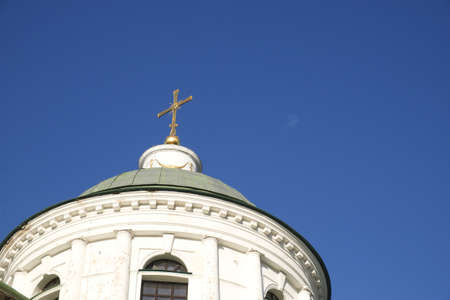 Domes of an Orthodox church against the sky. Orthodox baroque architecture. Clear sky. An old religious building.の写真素材