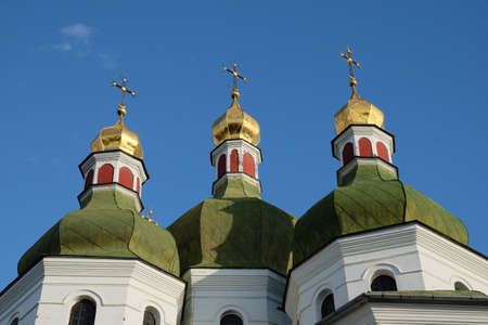 Domes of an Orthodox church against the sky. Orthodox baroque architecture. Clear sky. An old...