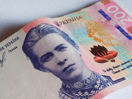 Banknote of 200 hryvnia, close-up. Portrait of poetess Lesya Ukrainka.の写真素材