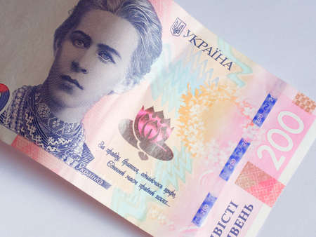 Banknote of 200 hryvnia, close-up. Portrait of poetess Lesya Ukrainka.