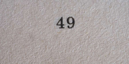 The number 49 printed on a piece of paper. Paper texture.の写真素材