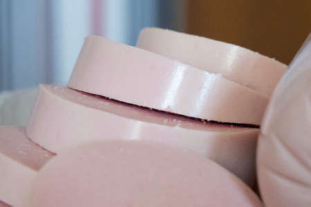 Boiled sausage cut into large chunks. Sausage, a close-up shot.の写真素材