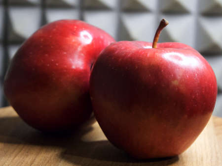 Two red apples of the red chief variety, a close-up shot.の写真素材
