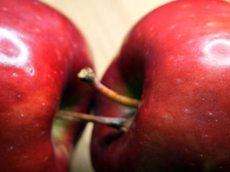 Two red chief apples close-up. Macro shot of ripe red apples.の写真素材