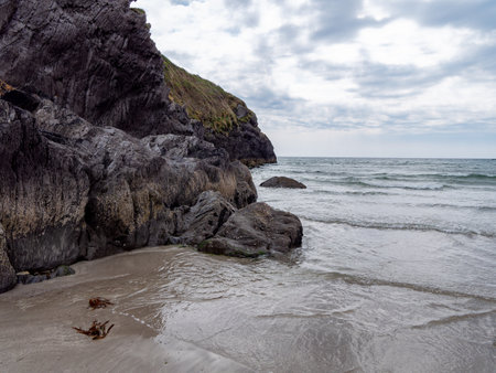 Sheer cliffs at Warren Beach. beautiful sky. The picturesque coast. Nature of Ireland, rock...