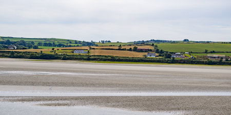 Sandy Irish beach on a summer day. Seaside landscape of Ireland.の写真素材