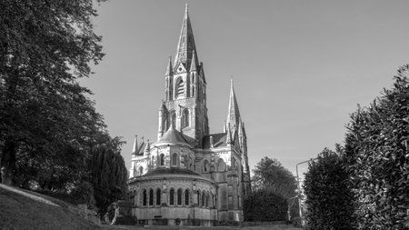 View of the old Christian Cathedral of the 19th century in the Irish city of Cork. Christian religious architecture in the Neo-Gothic style. Cathedral Church of St Fin Barre. black and white.の写真素材
