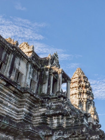 Carved stone walls of the ancient Angkor Temple complex in Cambodia.の写真素材