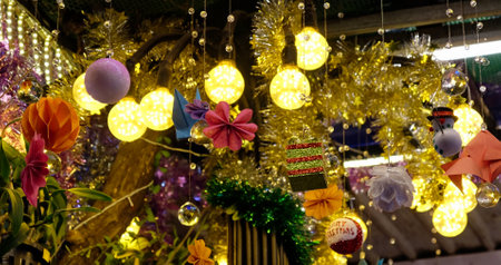 Image showcasing an array of holiday-themed lanterns and toys used for Christmas decor.の写真素材