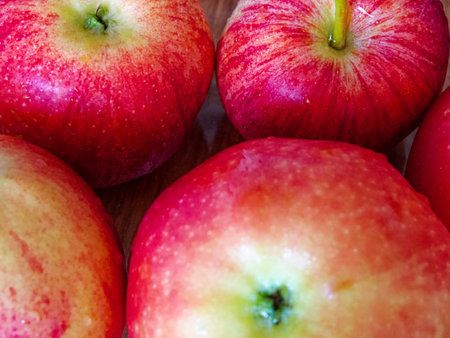 Fresh Apples Close-Up. A close-up of red apples with a yellow tinge, fresh and ripe. Uses for Food advertising, health blogs.の写真素材