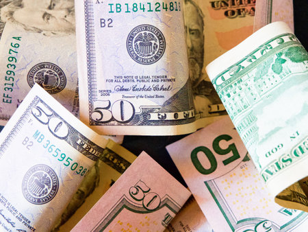 Financial Concept. Dollars in different states, suggesting money management.の写真素材