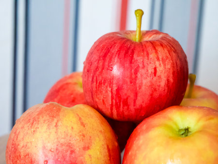 Juicy Apple Trio. Three vibrant apples, perfect for dietary and wellness content.の写真素材