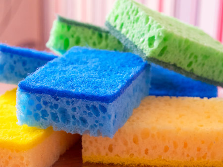 Household Scrubbing Tools. Multi-colored sponges, focus on absorbency. Uses for Product packaging, educational content.の写真素材