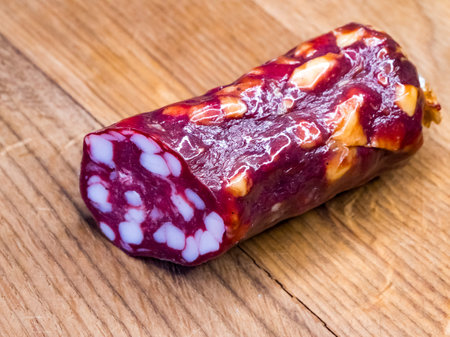 Textured salami, setting a delicious and inviting mood, perfect for food photography portfolios.の写真素材