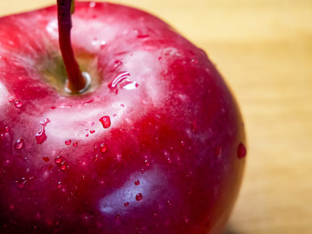 Ripe Apple Detail. Close-up of a moist apple, vibrant and fresh.の写真素材