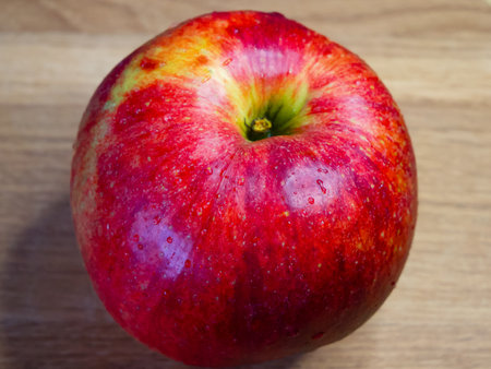 Appetizing Apple. A red apple with droplets, tempting and fresh.の写真素材