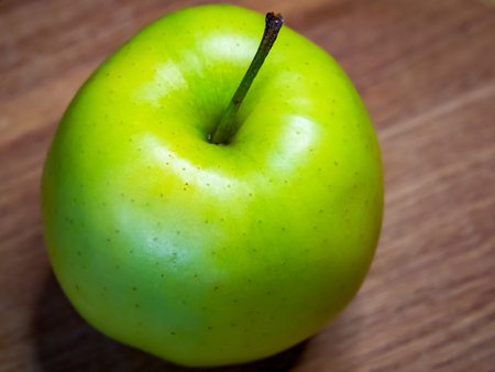 Image focused on one apple, suitable for educational content about fruits.の写真素材