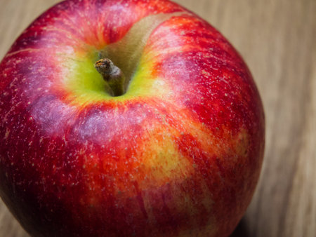 Fresh Apple Close-Up. Close-up of a red apple, highlighting its juicy texture.の写真素材