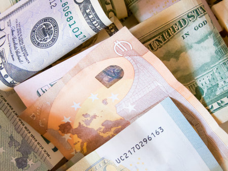 Financial Diversity. Pile of mixed European and American currency.の写真素材
