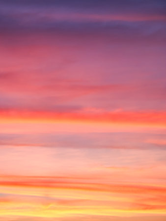 Sunset colors blend to create a romantic atmosphere; ideal for love themes.の写真素材